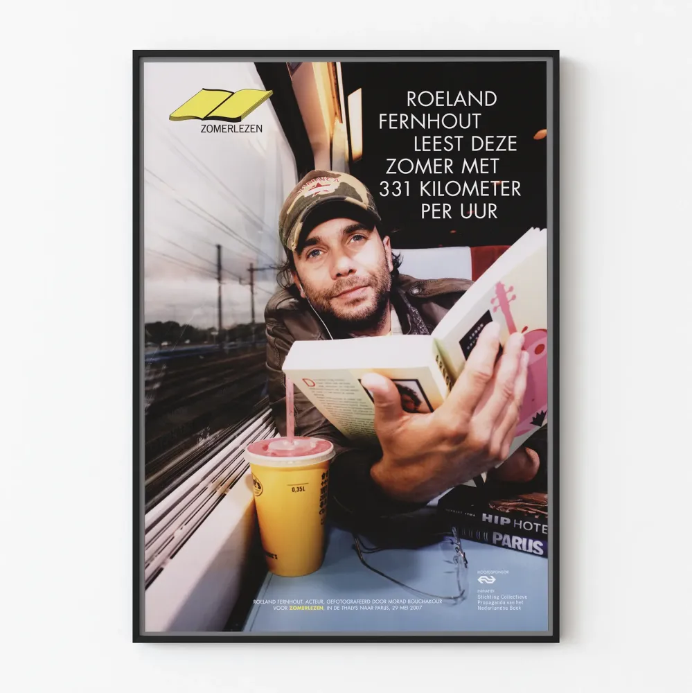 Juliste Roeland Fernhout lukemassa junassa